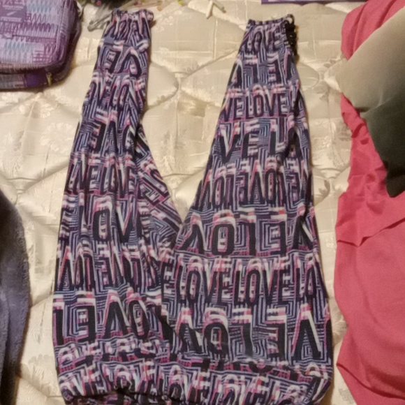 Purple love stretchy leggings size medium/ cute design at bottom of pant legs - Picture 3 of 3